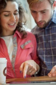 Couple using digital tablet together Stock Photos