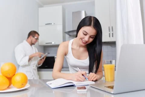 Couple using gadgets and planning day Foto stock