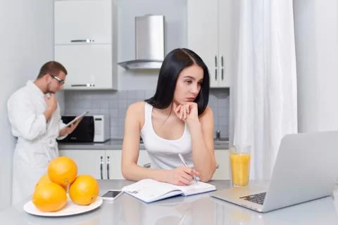 Couple using gadgets and planning day Stock Photos