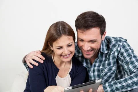 Couple using the ipad Stock Photos