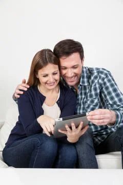 Couple using the ipad Stock Photos