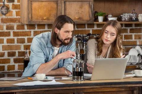 Couple using laptop 写真素材