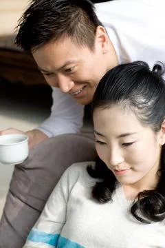 A couple using a laptop Stock Photos