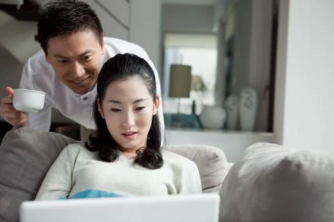 A couple using a laptop Stock Photos