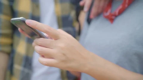 Couple using smartphone for direction on map while trip at Ayutthaya, Thailand. Stock Footage 104326089