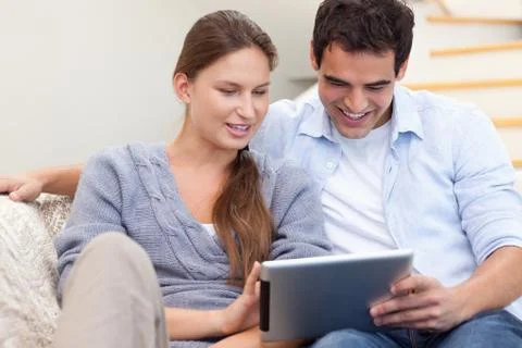 Couple using a tablet computer 写真素材