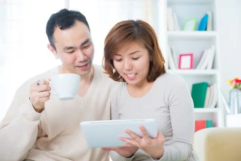 Couple using tablet computer Stock Photos