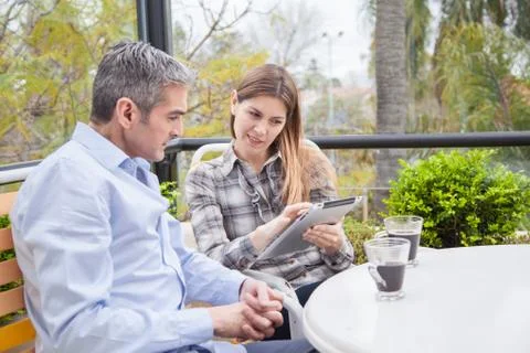Couple using the tablet 스톡 사진