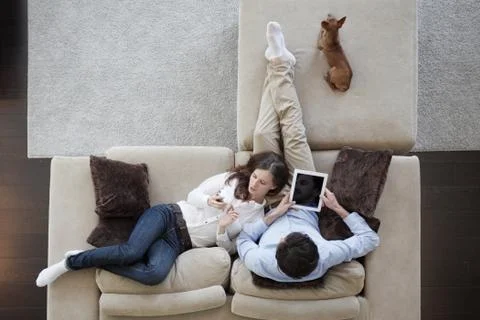 Couple using tablet Stock Photos
