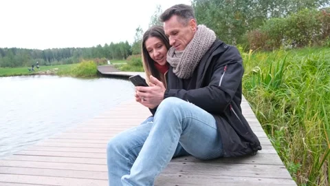Couple Using their smartphone. couple in smartphone Stock-Footage 170123104