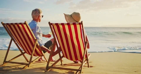 Couple on Vacton Watching the Sunset Stock Footage 81233330