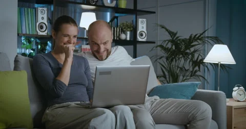 Couple videocalling friends online Stock Footage 162403205