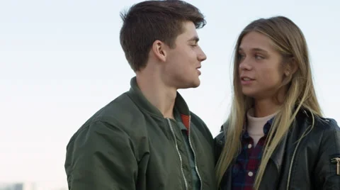 Couple visiting the Eiffel tower and taking selfies with each other. Video stock 63021169