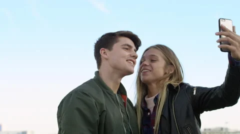 Couple visiting the Eiffel tower and taking selfies with each other. Stock Footage 63031532