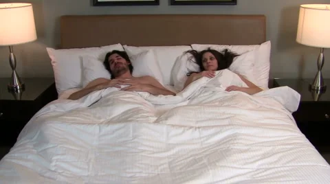 Couple wakes up V1 - HD Stock Footage 1006006