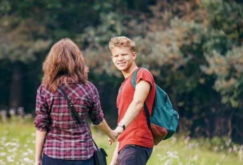 Couple on walk in the forest Stock Photos