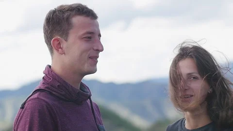 Couple walking against the backdrop of the mountains. Honeymoon. kiss on the Stock-Footage 105568304