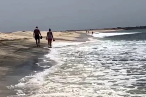 Couple Walking Along Beach Slow Motion 4 Stock Footage 96347327