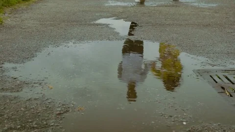 Couple walking and dancing after the rain at the embankment. Stock Footage 80254691