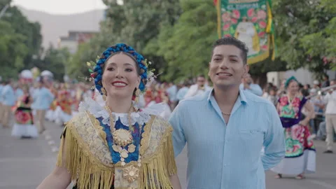 Couple walking and smiling in a parade in Mexico, 2026 Stock-Footage 342345822