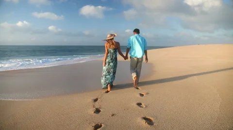 Couple Walking On Beach Enjoying Sunset Vacation On Romantic Honeymoon Travel Stock Footage 55852817