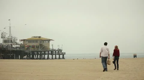 Couple Walking on Beach Stock Footage 11443114