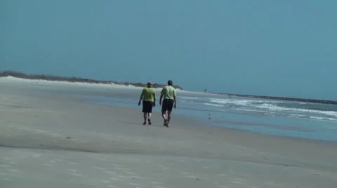 Couple Walking On The Beach Stock Footage 24233938