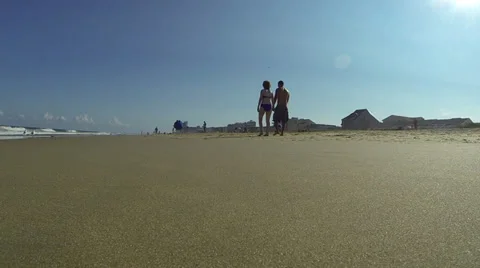 Couple Walking on Beach Stock Footage 37695751