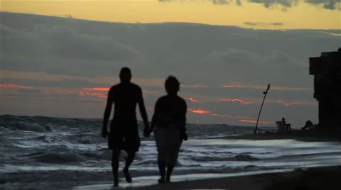 Couple walking on beach. Stock Footage 48145588