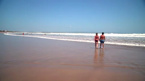 Couple Walking on Beach Stock Footage 49319747