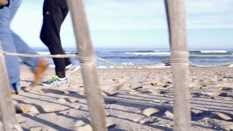 Couple walking on the beach Stock Footage 73927611