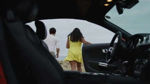 Couple walking on the beach Stock Footage 86563783