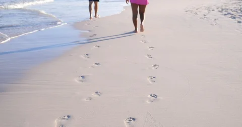 Couple Walking On Beach holding hands pov young love happy paradise 스톡 동영상 101731012