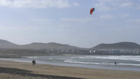 Couple walking on the beach in Lanzarote Stock Footage 171338547
