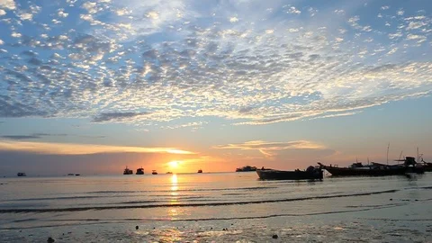 Couple walking on the beach sunset background Stock Footage 90954386