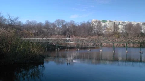 Couple walking on a bridge 動画素材 167667499