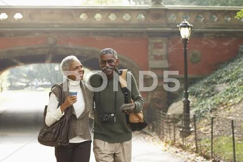 Couple Walking in City, New York City, New York, USA Stock Photos