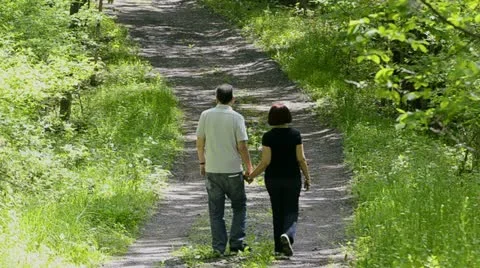 Couple walking on country road  4 Stock Footage 11069685