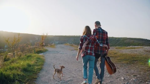 Couple walking in the countryside  Stock Footage 75257899