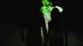 The couple walking in the dark street through the smoke. slow motion 4k or 4k+ Resolution