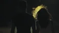 The couple walking in the dark street through a smoke. slow motion 4k or 4k+ Resolution