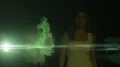 The couple walking in the dark street through a green smoke. slow motion 4k or 4k+ Resolution