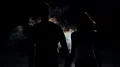 The couple walking in the dark through a smoke cloud. slow motion 4k or 4k+ Resolution
