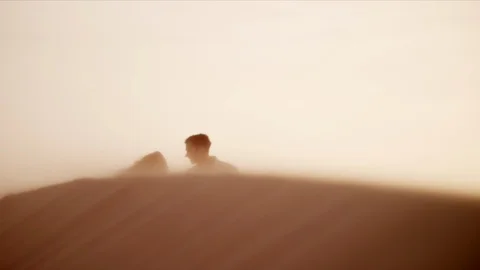 Couple walking on desert. Stock Footage 119386938
