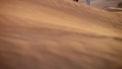 Couple walking on desert. Stock Footage 119507936