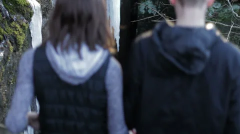 Couple walking down stairs Stock Footage 34043620