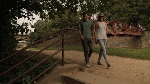 Couple walking down stairs Stock Footage 145737588