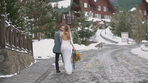 Couple walking down the street Stock-Footage 163533405
