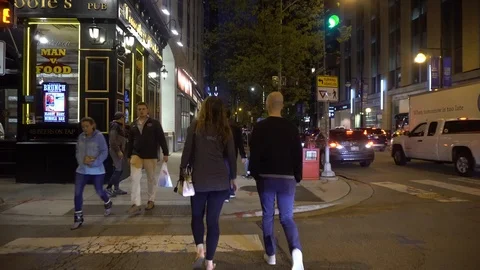  a couple walking downtown Chicago at night on a nice summer day Stock Footage