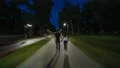 The couple walking in the evening park. Hyperlapse 4k or 4k+ Resolution